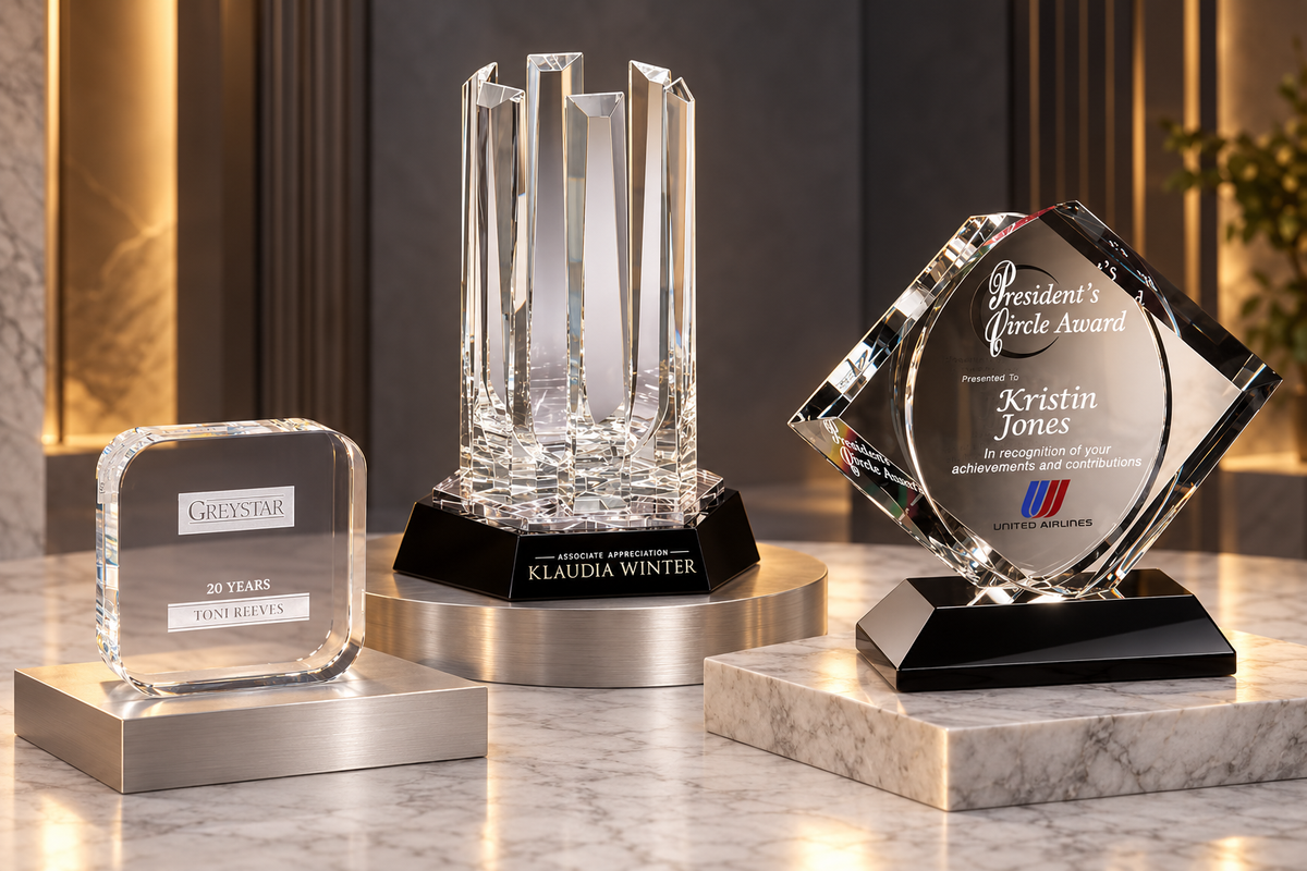 Engraved App, CEO and Artistry awards displayed to their relative catalog dimensions